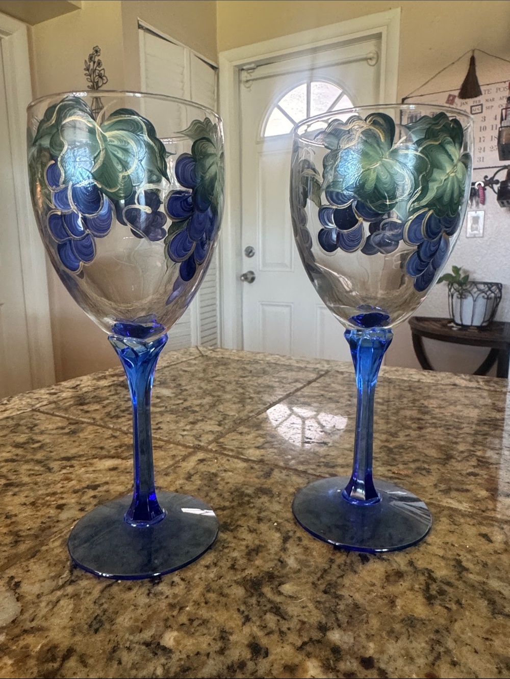 Hand-Painted Blue Stem Wine Glasses with Green and Blue Floral Accents